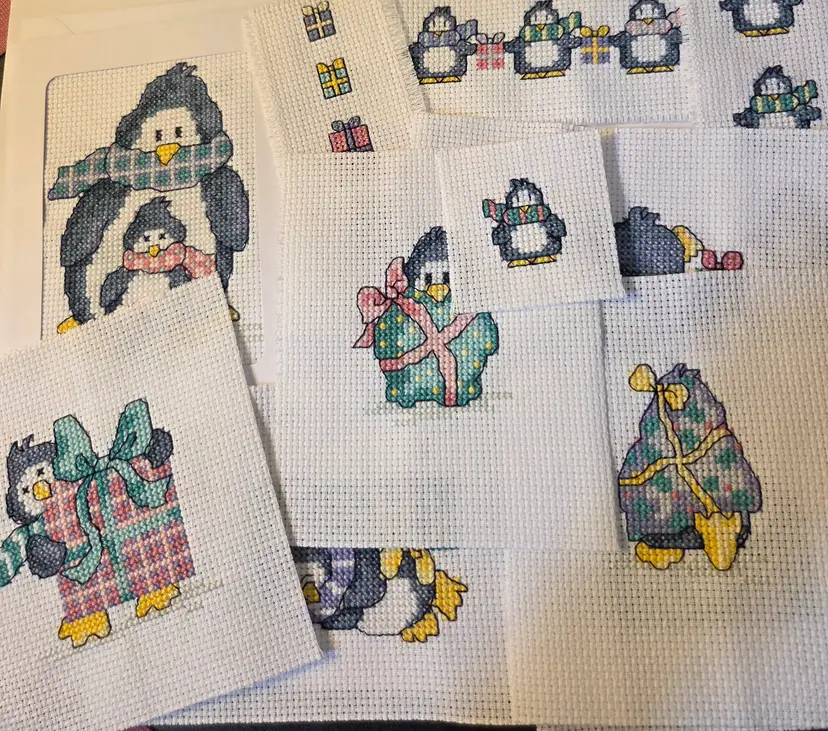 Lot of 11 Cross-stitched pieces Penguin Christmas themed New