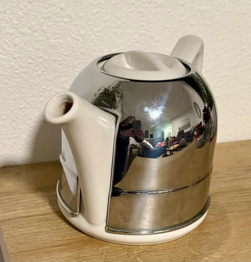 Figgjo Flint Teapot within a stainless steel shell for heat retention.