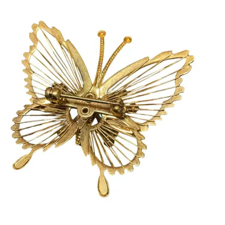 Monet Signed Gold tone Butterfly With Clear Rhinestones.