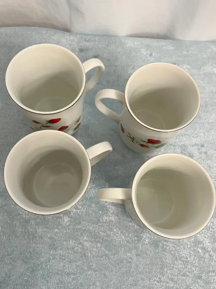 Set Of Four Otagiri Japan porcelain mugs featuring a "Strawberries & Blooms" pattern