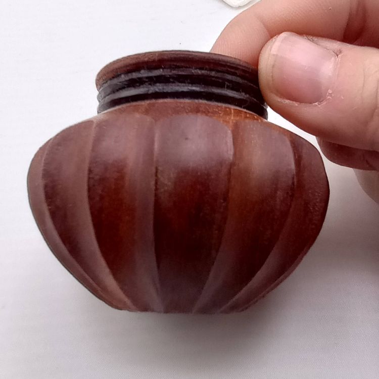 Hand-carved wooden mini pot, signed