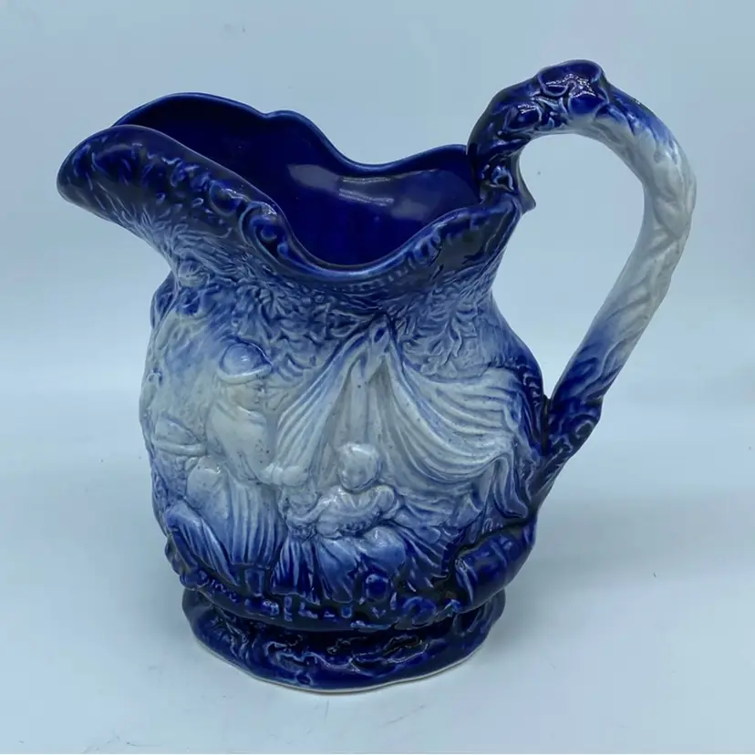 #2109 Blue and white relief-molded Burleigh Ironstone pitcher from Staffordshire.