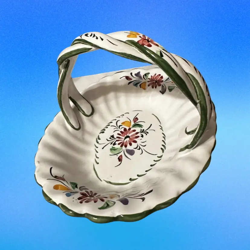 A vintage Portuguese hand-painted ceramic basket