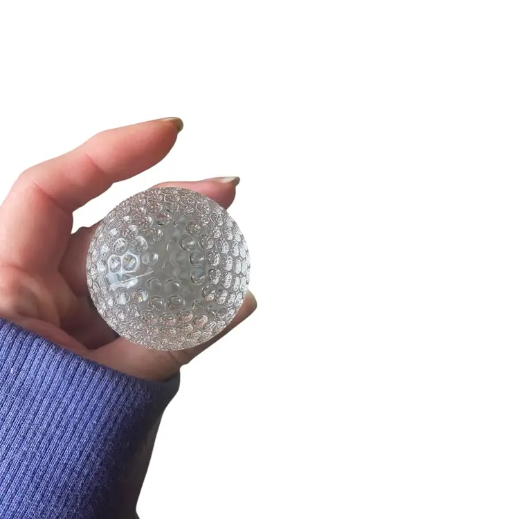 This is a Mikasa crystal golf ball wine bottle stopper from the "Tee Time" collection