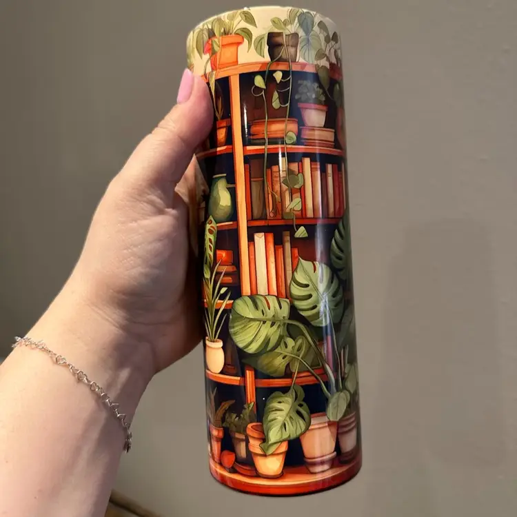 Plants and books skinny tumbler
