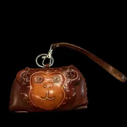 Adorable Vintage Hand Stitched Smalle Genuine Handcrafted Coin Purse/ Pouch. With Embossed/ Tooled Monkey Designs. Leather Wrist Strap & Key Ring. So Darn Cute!! Great For Gift Giving , Stocking Stuffer. Fun Gift For All Ages. Tis The Season !!