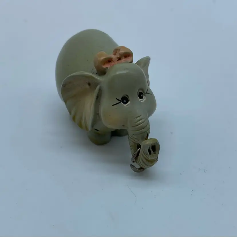 #1464 vintage ceramic elephant figurine, likely a keychain or charm.