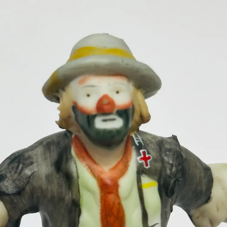 #1163 Flambro Emmitt Kelly JR, Porcelain Figure, “Balancing Act” Clown Figurine, No Feather