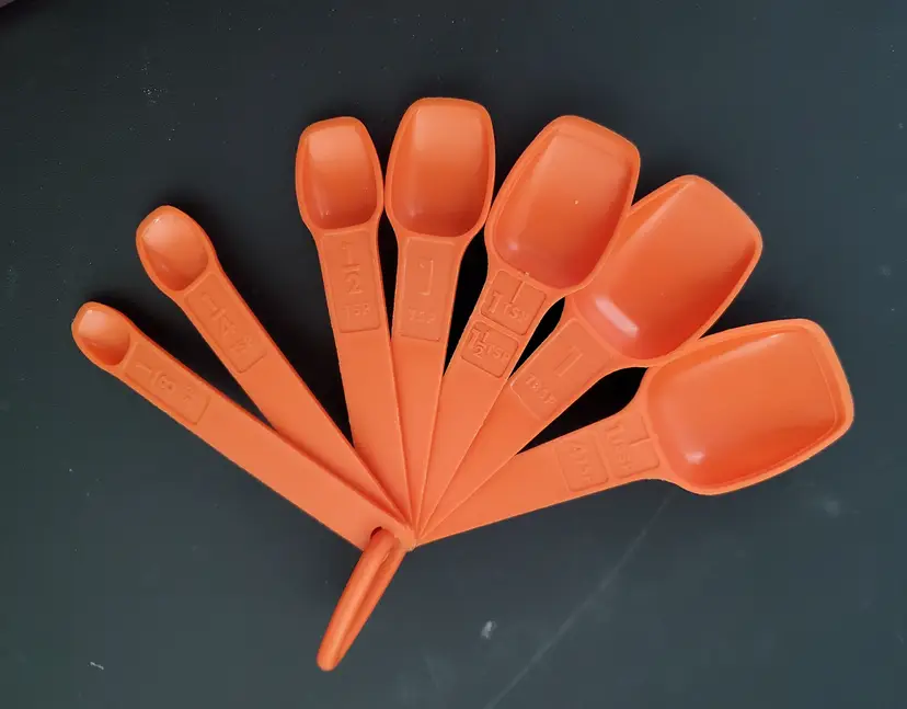 Vintage Orange Tupperware 7 Matching Measuring Spoons with Triangle Ring