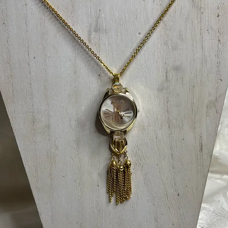 Up Cycled watch pendant, handmaid