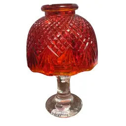 This is an L.E. Smith Amberina glass fairy lamp with diamond cutting.circa 1900-1920