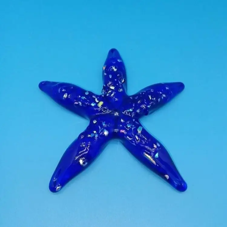 Hand blown cobalt glass starfish with colored pieces 5 in