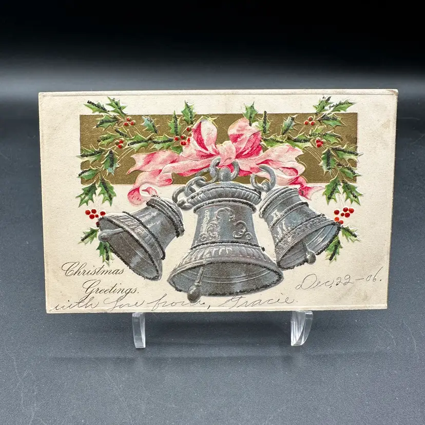 "Christmas Greetings" Antique Silver Bells Pink Bow Christmas Postcard
