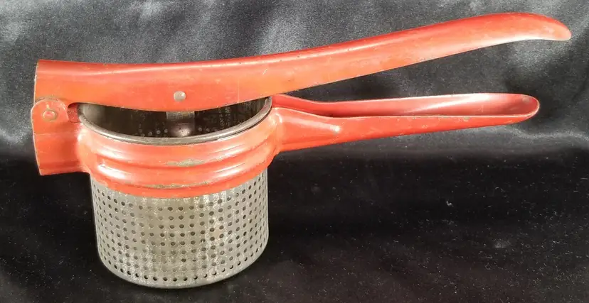 Vintage Red Handled Metal Potato Ricer