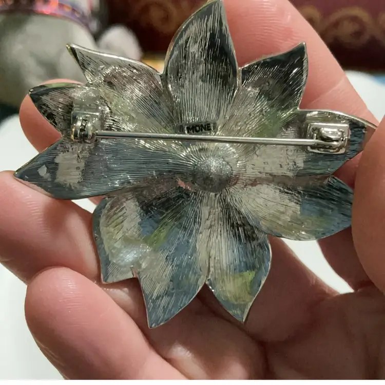 Vintage Silvertone Monet  Poinsettia Brooch. Brown Enamel Leaves And Petals Accented With Clear Glass Crystals. Note Pin Is A Little Loose ~ Marked As Sale Item .