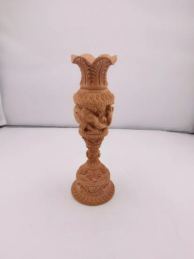 Carved wooden vase w animals