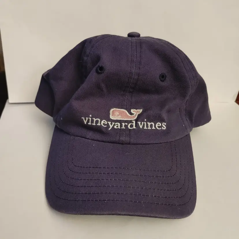 Vineyard Vines Navy hat with pink accents. Velcro strap.