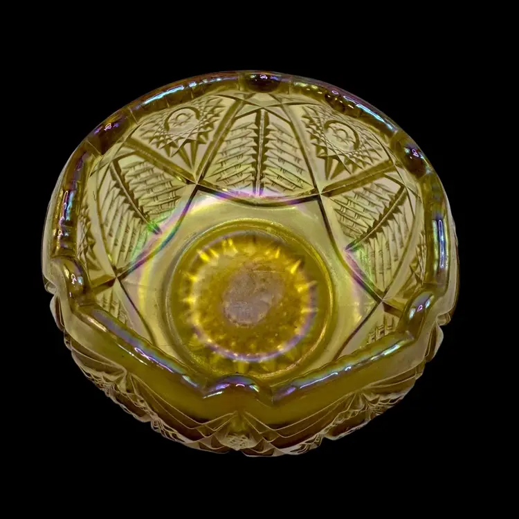 Vintage Carnival Glass Rose Bowl with a marigold or gold iridescent finish.
