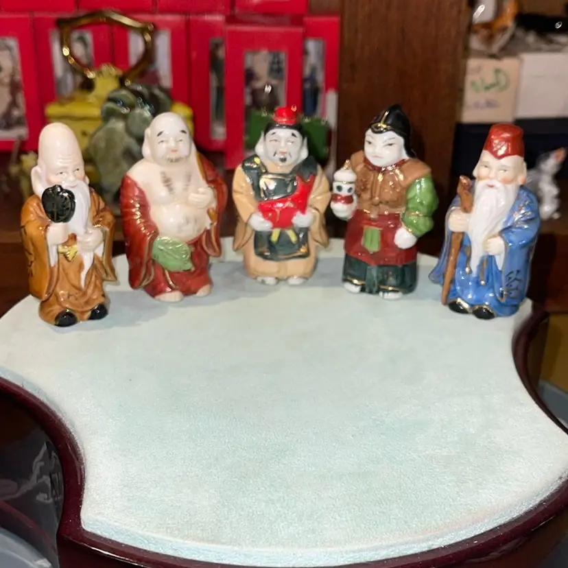 Five Japanese figures approximately 2.5 inches each made in Japan