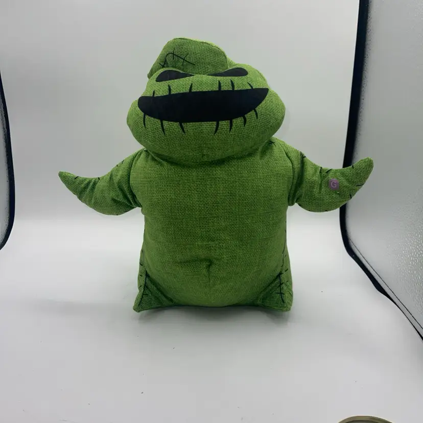 Oogie Boogie Animated Plush - Plays and dances to “Oogie Boogie Song” Works 13”
