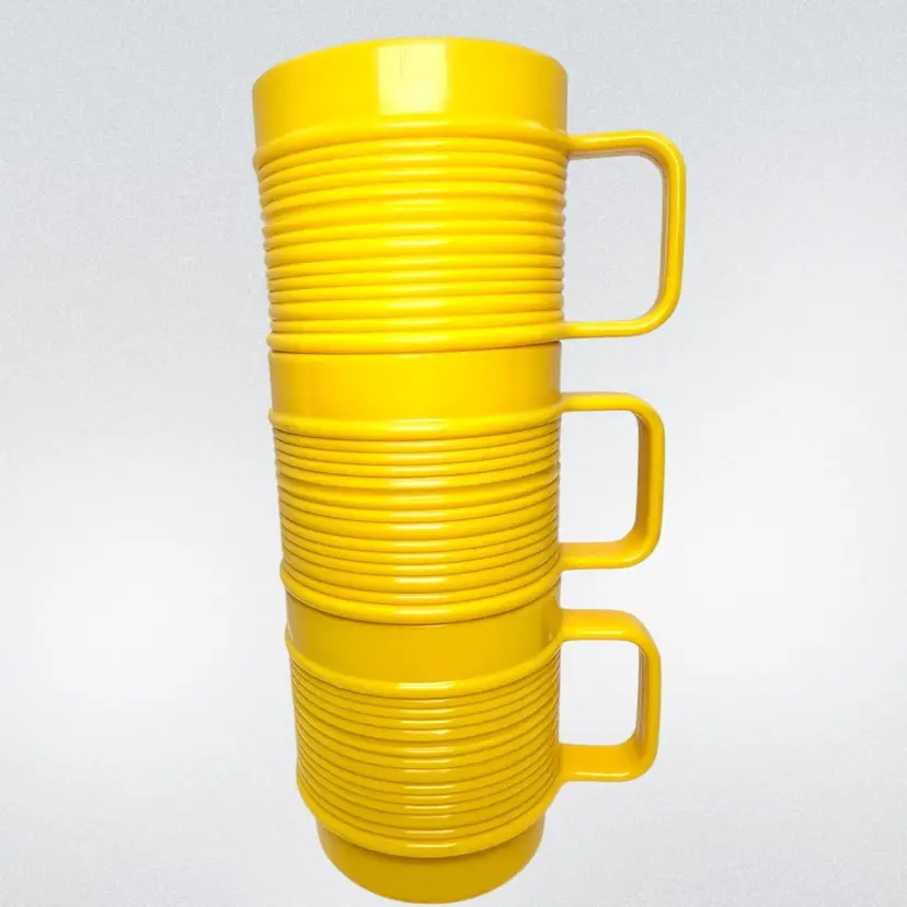 Set Of Three Vintage Yellow Rubbermaid Stackable Plastic Cups with Handles. Ribbed Design On Side.