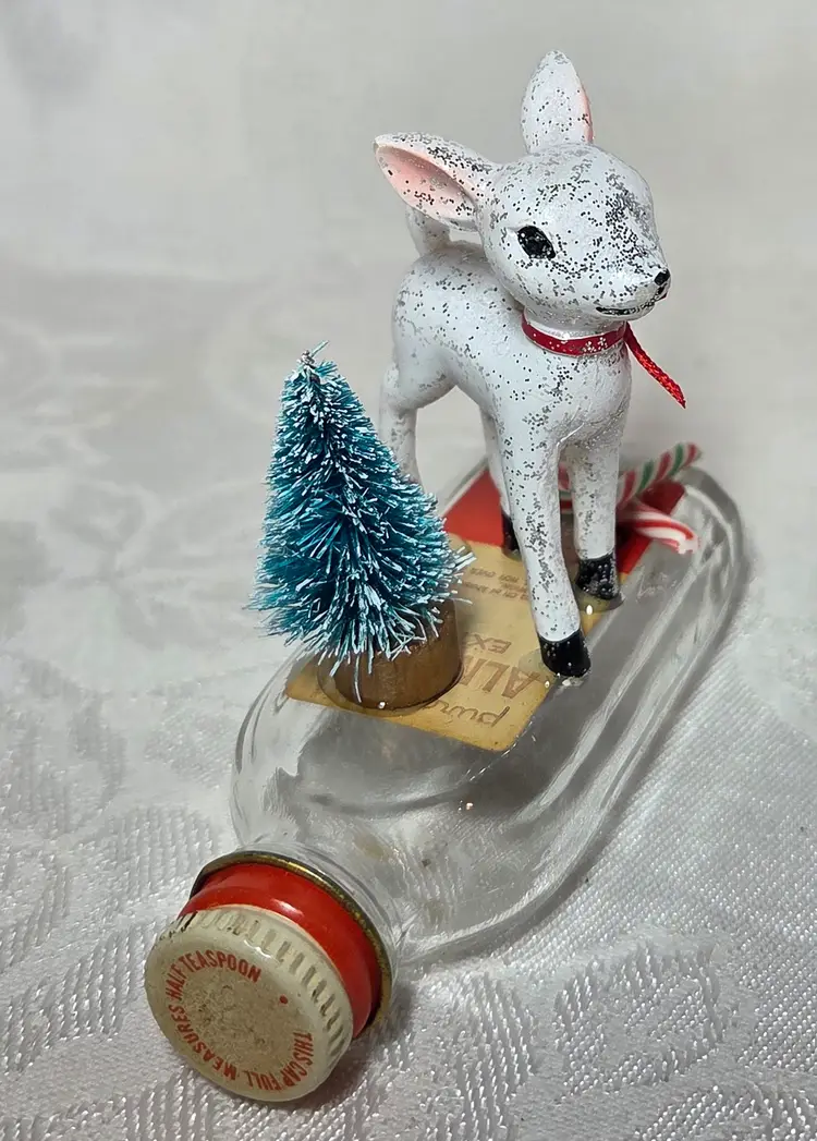 Cute handmade Christmas Decor w/Deer standing on vintage Almond Extract Bottle