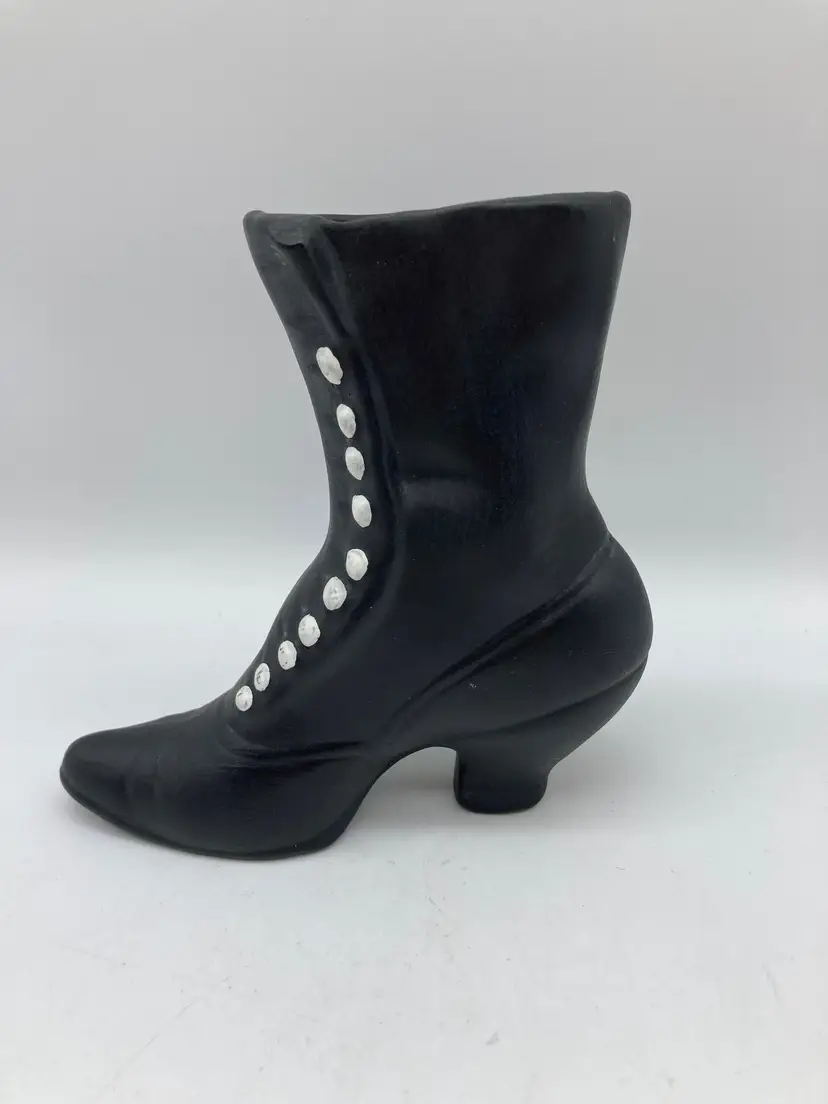 vintage black ceramic Atlantic Mold boot planter with contrasting white buttons