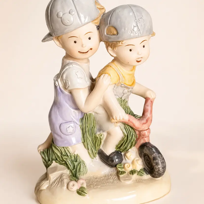 Goebel Kinderland, Goebel figurine, Kinderland figurine, vintage Goebel, Goebel Germany, porcelain children figurine, children on tricycle, tricycle figurine, rare Goebel, 1940s Goebel, 1950s Goebel, German porcelain, vintage porcelain figurine, collectible figurine, nursery decor, cottagecore decor, antique style figurine, vintage home decor, estate find, rare porcelain collectible  Goebel Kinderland  1900 Germany Goebel figurine, Kinderland figurine VERY RARE  #Goebel #Kinderland #GoebelKinderland #VintageGoebel #GermanPorcelain #PorcelainFigurine #VintageCollectibles #RareFind #VintageDecor #Cottagecore #EstateSale #PorcelainCollection #MidCenturyDecor
