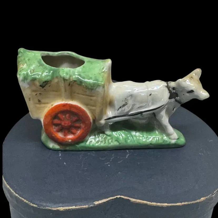 Vintage Japanese ceramic cow pulling a cart pincushion. Pincushion Missing.