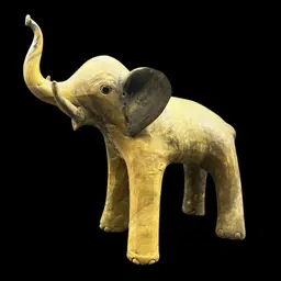 #249B Vintage Crushed Oyster Shell Elephant Figurine Tusk Up. Marbled Look