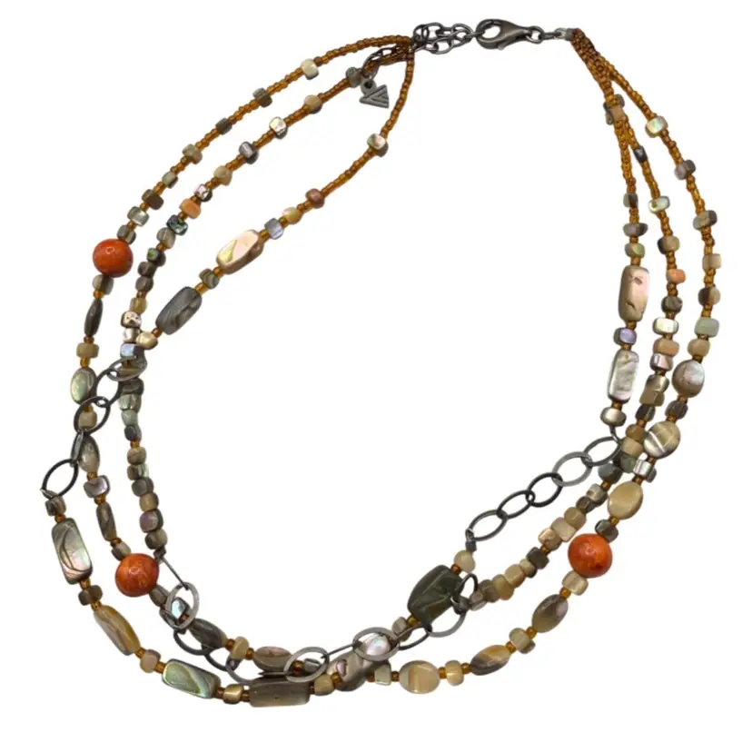 retired Silpada "Fiesta Fun" multi-strand necklace made of sponge coral, abalone shell, and seed beads with sterling silver accents.