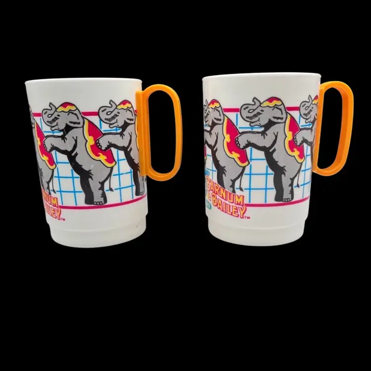 Vignette #7 Includes A Vintage Pair Of 1990s Ringling Bros Barnum & Bailey Circus Cup Elephants, Two Miniature Elephant Figurines - Composite Or Wood In Dark Finish, And A Miniature Ceramic Painted Giraffe