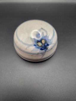 Pottery paperweight signed