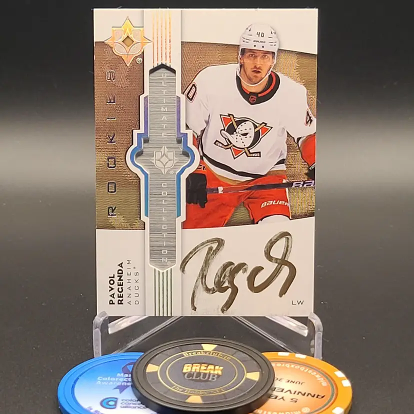 Pavol Regenda Rookie Auto 2022-23 Upper Deck Ultimate Collection Ultimate Emblems Autograph Insert (smudged) Card #UE-RE - Anaheim Ducks