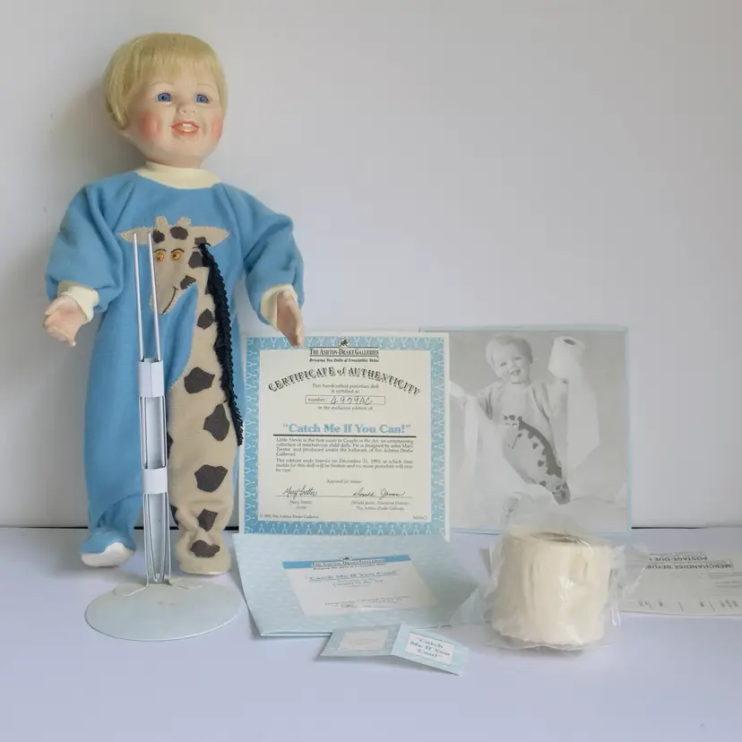 #1199 Ashton Drake, Boy Giraffe Dressed Doll, “ Caught In The Act”