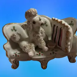 Porcelain Spaghetti Poodle Figurine On A Couch (Japanese)