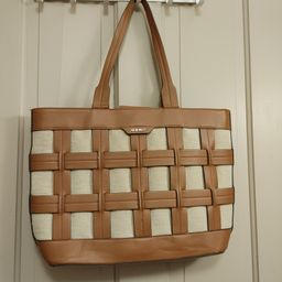 Nine West tote bag/purse. Wear on 1 handle. As shown.