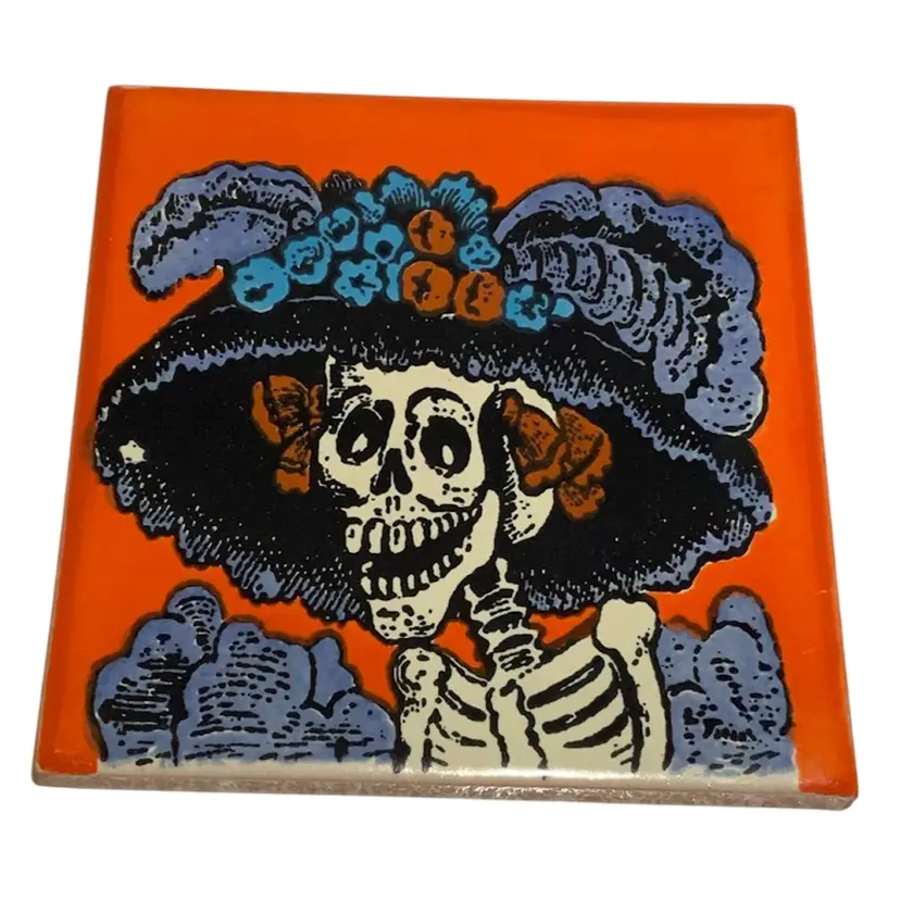 Hand Crafted Talavera Mexican Tile Mosaic Day of the Dead Orange Background Catrina Featuring Thee Catrina In Purple And Black Feathery Hat With Plumes And Blue Red Satin Lace Roses In A Purple Dress 4.5” By 4.5” Red Clay