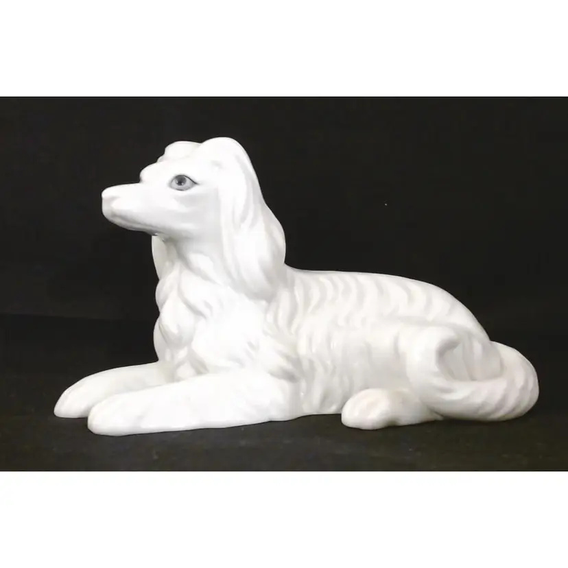 Vintage White Porcelain Afghan Hound Figurine resting. (6-31)