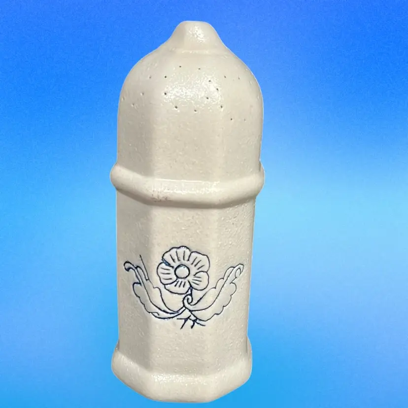 This is a 19th-century stoneware muffineer with blue floral decoration.Rare! Replica???maker Unknown