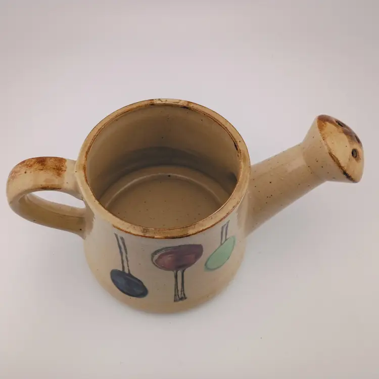 Vintage Nevco watering can planter