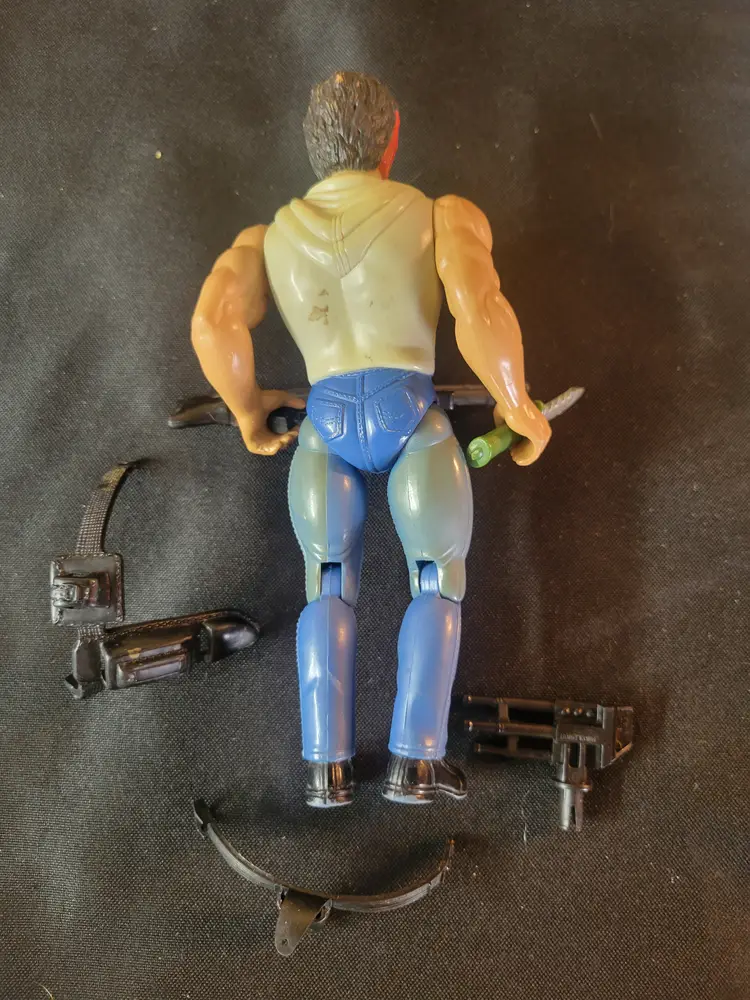 Rambo figure with weapons