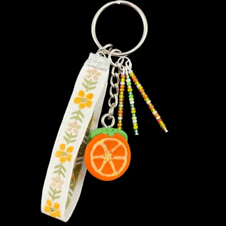 Handmade By Me - Orange Bag Charm With Orange & Green Seed Bead Strands And Flower Ribbon, Polymer Clay Orange Slice Charm Keychain, Keychain With Polymer Clay Orange Charm And Seed Bead Strands And Ribbon, Handmade Bag Charm, Handmade Purse Charm, Handmade Keychain, NN Artist Made