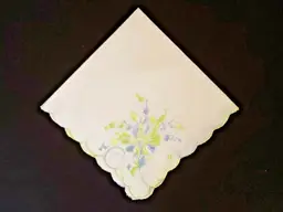 Floral Handkerchief Embroidered with nice edge treatment folded & creases