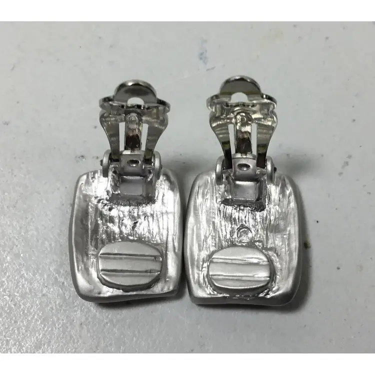 MCM earrings, silver tone metal, clip on, shine like never worn