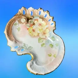 Antique Hand-painted porcelain decorative dish with floral motifs and gilded rim. Circa 1900-1920 Not Marked 6” Long 3” Wide