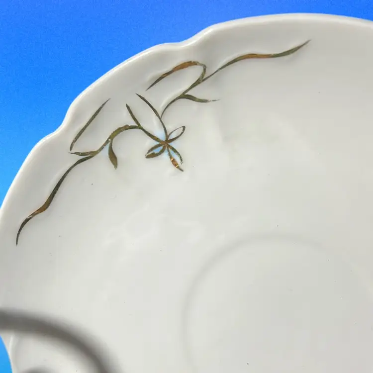Vintage porcelain saucer with embossed Gold Bows pattern Stamped Made In Germany Cottage Core Must Have!!!