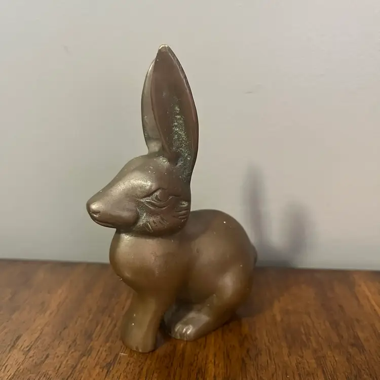 Vintage solid brass bunny figurine in a bronze finishing.