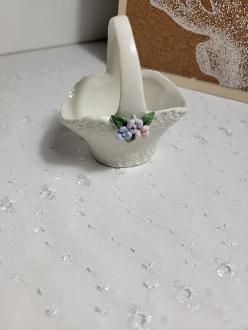 Cute porcelain basket with flowers