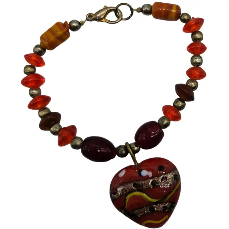Art glass bracelet with heart pendant